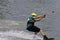 Teenager wakeboarding on a lake