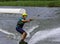 Teenager wakeboarding on a lake