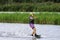 Teenager wakeboarding on a lake