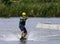 Teenager wakeboarding on a lake - Brwinow, Masovia, Poland