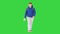 Teenager walking and taking off medical mask on a Green Screen, Chroma Key.