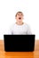 Teenager yawning behind Laptop