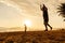 Teenagers balance on slackline silhouette