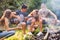 Teenagers camping in forest.