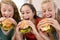 Teenagers Eating Burgers