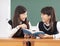 Teenagers girl student studying in classroom