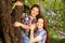 Teenagers have fun in the park, playing guitar, singing son