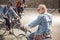 Teenagers having fun and riding bicycles in skateboard park