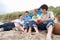 Teenagers having picnic