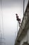 Teenagers jumping back side from a bridge, Ecuador