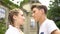 Teenagers looking at each other, first relations, romantic date, feeling love