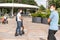 Teenagers in medical masks walk in the Park on a Sunny day