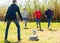 Teenagers play football with excitement