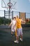 Teenagers playing basketball