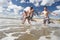 Teenagers playing on beach