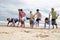 Teenagers playing on beach