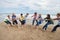 Teenagers playing tug of war