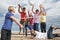 Teenagers playing volleyball