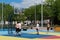 Teenagers plays streetball at new sport zone at expocenter, Kyiv, Ukraine