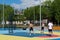 Teenagers plays streetball at new sport zone at expocenter, Kyiv, Ukraine