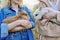 Teenagers with rabbits in their hands, pets a couple of decorative rabbits