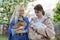 Teenagers with rabbits in their hands, pets a couple of decorative rabbits