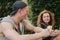 Teenagers relaxing outdoors and smiling