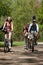 Teenagers riding on bicycles