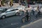 Teenagers riding bikes on the road in Harlem, New York, USA.