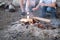 Teenagers, sitting around the fire