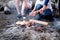 Teenagers, sitting around the fire