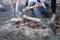 Teenagers, sitting around the fire