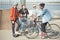 Teenagers spending time in skateboard park, hipster style concept