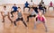 Teenagers stretching in dance hall