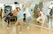 Teenagers training movements of street dance in choreography class