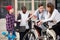 Teens chatting near bikes