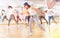 Teens dancing hip-hop dance together in dance hall