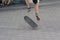 Teens ride a skateboard in the city