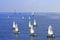 Teens sailing boats regatta