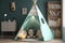 teepee with bookshelf and reading nook, perfect for quiet time or storytime