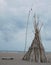 Teepee made of bamboo on the beach on a grey day in Bali