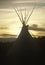 Teepee silhouetted at dusk in Taos, NM