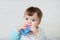 Teether toy for infant. Baby milk teeth growing and scratching. temporary first tooth