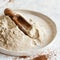 Teff flour in a plate with a spoon