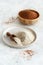 Teff flour on a plate and teff grain in a bowl