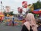 Tegal, May 2023. Photo portrait of Tegal city square in the afternoon with many visitors visiting the carousel