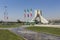 TEHERAN, IRAN - OCTOBER 03, 2016: Azadi Tower with flasgs of Ira