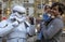 Tehran, Iran - 2019-04-03 - Child is Frightened When Father Hands Him to Star Wars Storm Trooper Character at Street