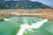 Tehri Lake, water surface behind of fast moving motor boat in Tehri lake. Trail on water surface behind speed boat. Rear view of