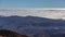 Teide Observatory over the huge wave clouds timelapse, Tenerife, Spain